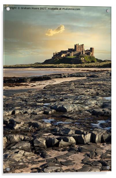 Bamburgh Castle from rocky beach Acrylic by Graham Moore