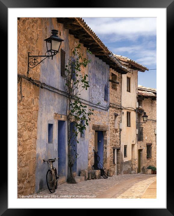 bicycle leaning on a wall in Valderrobres, Teruel Framed Mounted Print by Pere Sanz