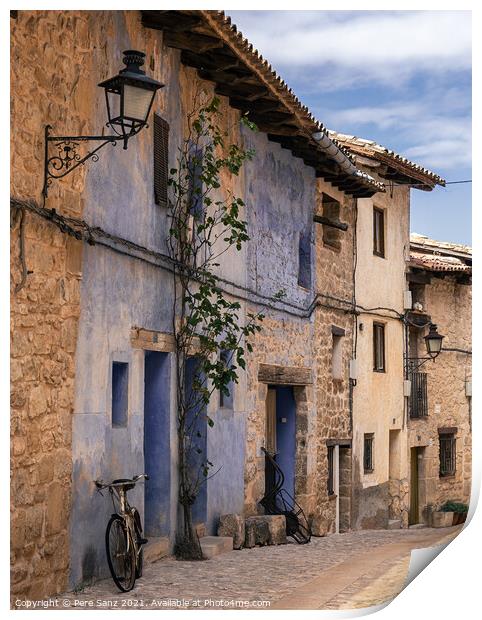 bicycle leaning on a wall in Valderrobres, Teruel Print by Pere Sanz