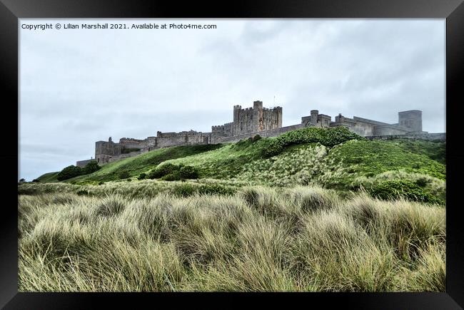Grey skies over Bamburgh Castle , Northumberland.  Framed Print by Lilian Marshall