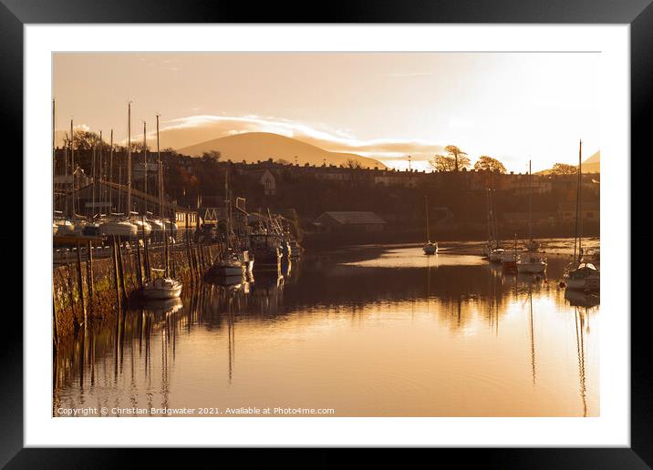 Caernarfon Harbour at sunrise Framed Mounted Print by Christian Bridgwater