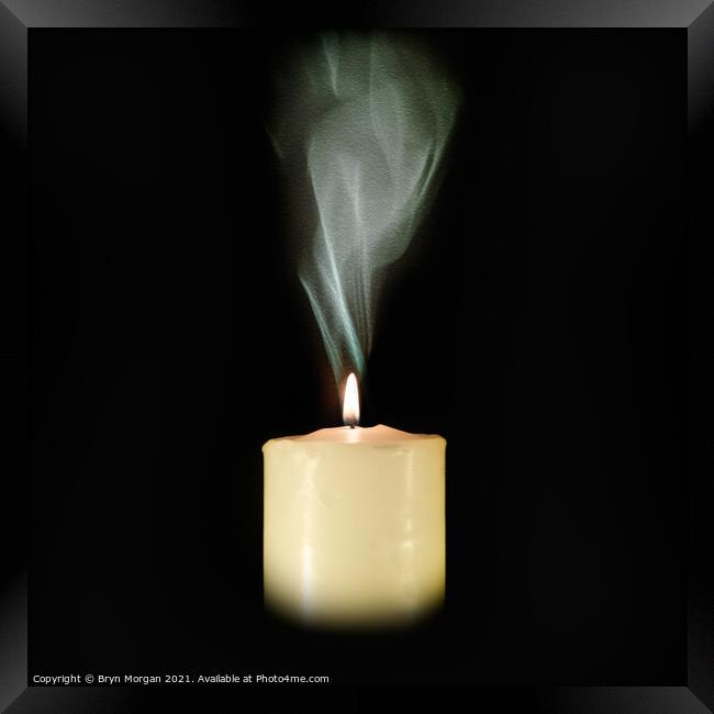 Candle with rising smoke Framed Print by Bryn Morgan