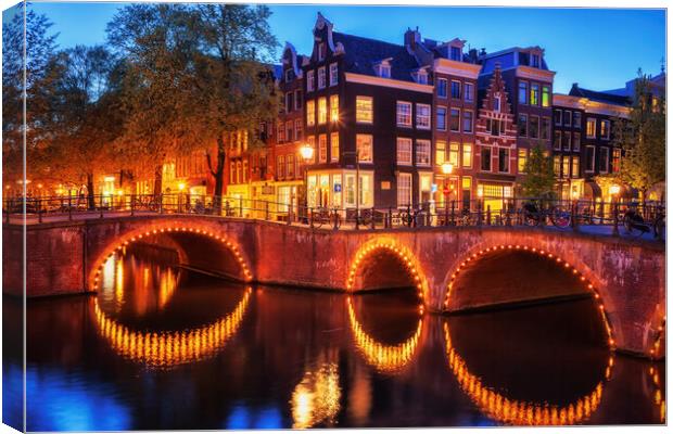 City of Amsterdam by Night Canvas Print by Artur Bogacki