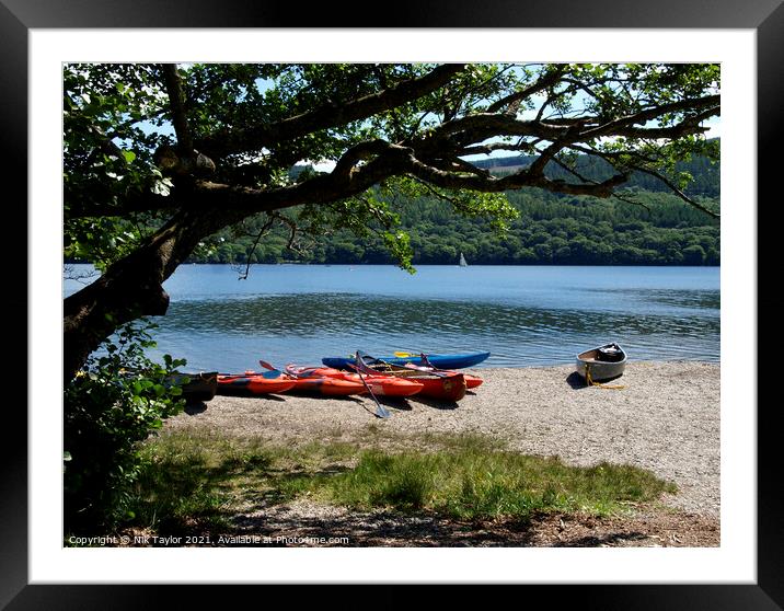 Canoes on the edge of Coniston Water  Framed Mounted Print by Nik Taylor