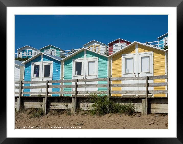 Beach huts on Summerleaze beach Framed Mounted Print by Nik Taylor