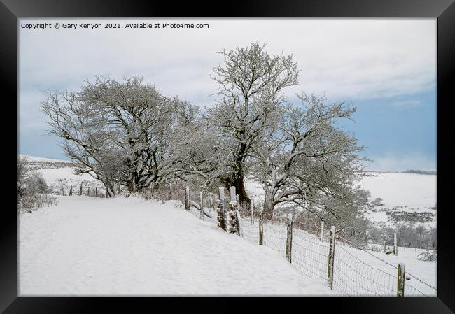 A snow covered field  Framed Print by Gary Kenyon
