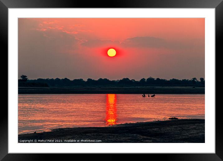 Sunsetting by river, Zambia, Africa Framed Mounted Print by Mehul Patel