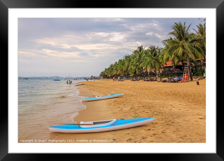 Kayaks on Ba Keo Beach in the evening sun, next to Framed Mounted Print by SnapT Photography