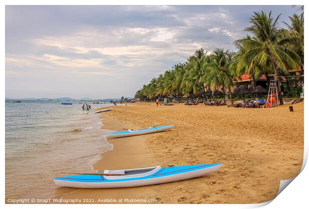 Kayaks on Ba Keo Beach in the evening sun, next to Print by SnapT Photography