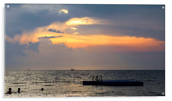 Silhouette of bathers and floating pier at sunset  Acrylic by SnapT Photography