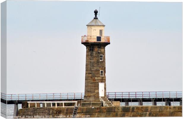 Whitby Lighthouse and pier Canvas Print by Fiona Williams