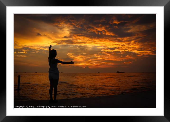 A female model silhouette controlling the movements of clouds on Ba Keo Beach Framed Mounted Print by SnapT Photography