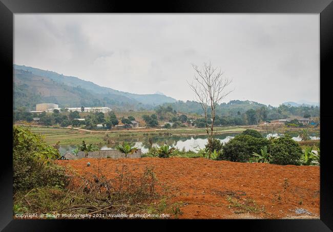 A dull, misty morning, on a rice paddy in Sapa Vietnam, with a lake. Framed Print by SnapT Photography