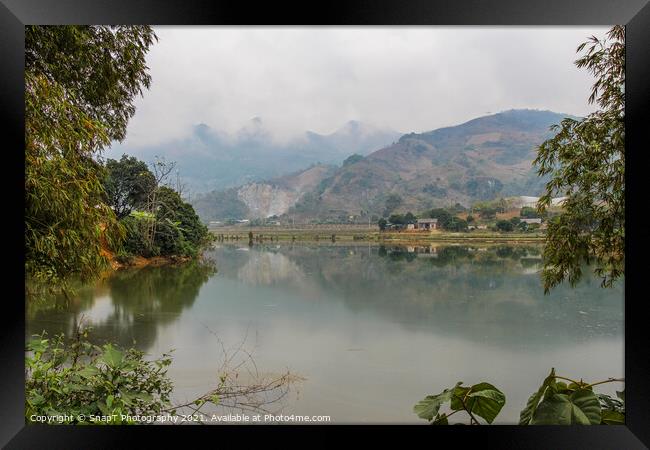 A mountain reflection on a lake in a rice paddy, Sapa, Vietnam Framed Print by SnapT Photography