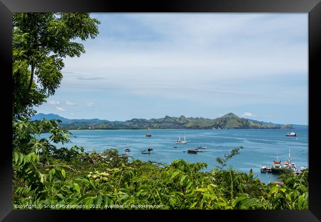 A view over Labuan Bajo harbour and Palua Karawo in early morning, Indonesia Framed Print by SnapT Photography