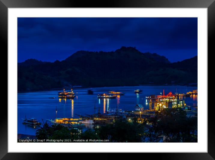 A view over the harbour at Labuan Bajo and nearby island at night Framed Mounted Print by SnapT Photography