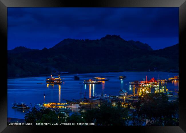 A view over the harbour at Labuan Bajo and nearby island at night Framed Print by SnapT Photography