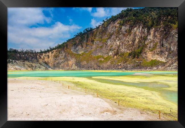 The yellow sulphur deposits and blue lake of Kawah Putih, Indonesia Framed Print by SnapT Photography