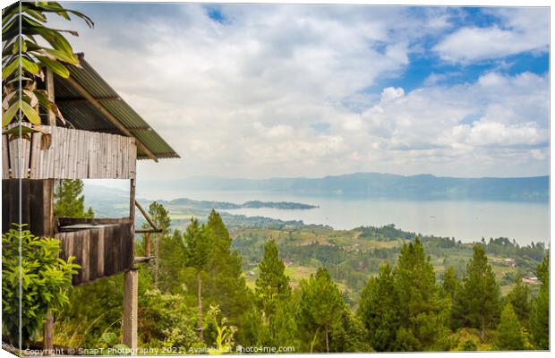 A view over the volcanic crater Lake Toba from Samosir Island, Indonesia Canvas Print by SnapT Photography