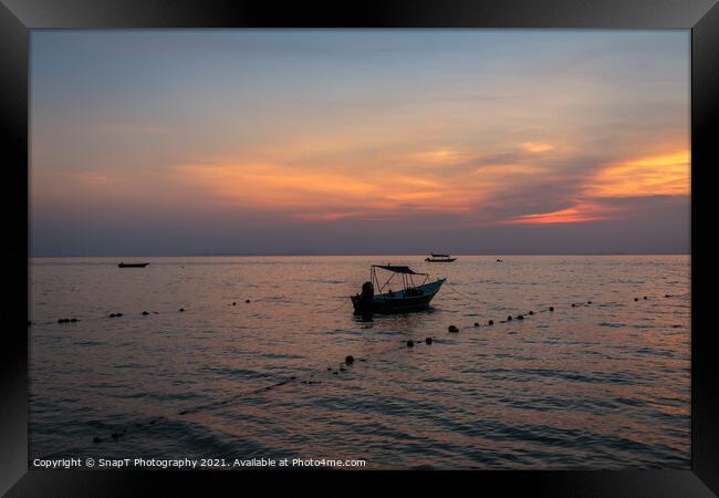 A speed boat at Melina Beach, Tiomen Island, at sunset, Malaysia Framed Print by SnapT Photography
