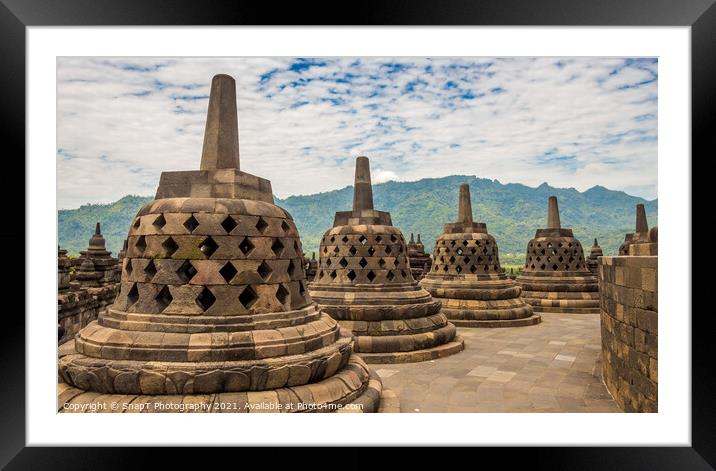 Stupas that look like bells on top of the Borobudur Buddhist temple, Indonesia Framed Mounted Print by SnapT Photography