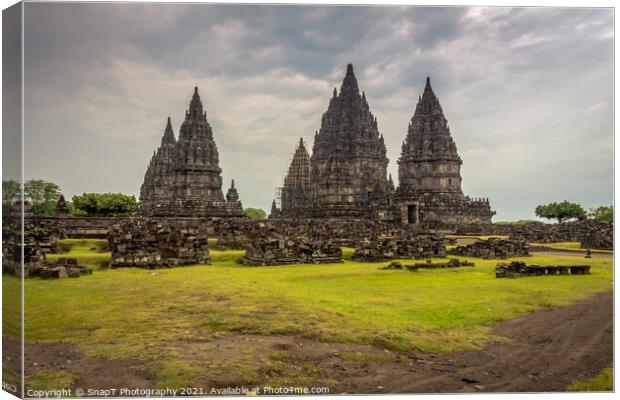 Prambanan hindu temple on a cloudy evening in Yogyakarta, Indonesia Canvas Print by SnapT Photography