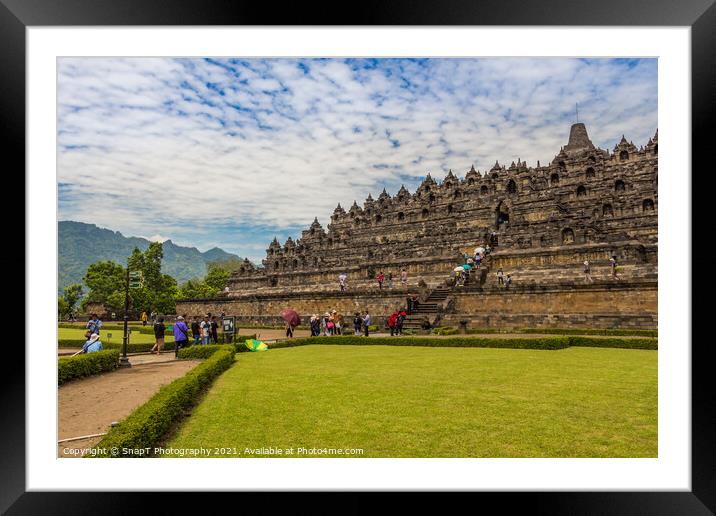 A line of tourists ascending the stairs on the Borobudur Buddhist temple, Indonesia Framed Mounted Print by SnapT Photography