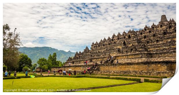 A line of tourists ascending the stairs on the Borobudur Buddhist temple, Indonesia Print by SnapT Photography