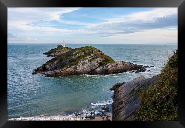 Guiding Light of Mumbles Framed Print by Peter Thomas