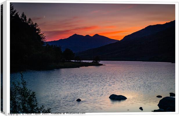 Orange skies over Snowdon Canvas Print by Peter Taylor