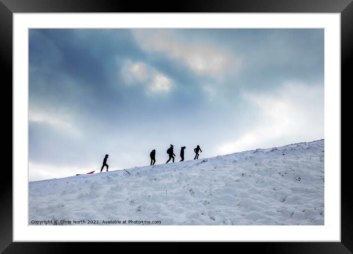Family snow day. Framed Mounted Print by Chris North