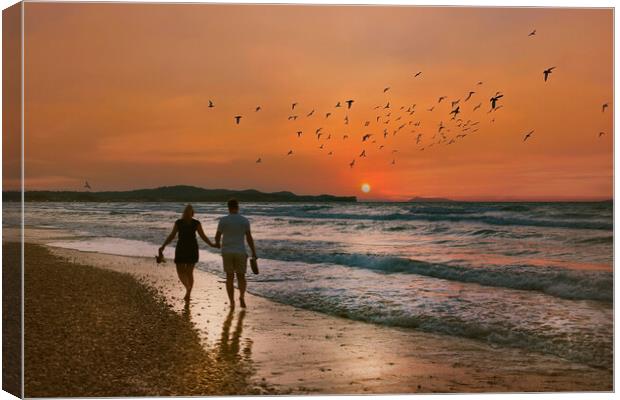 Lovers Stroll along the Beach at Sunset Canvas Print by Dave Williams