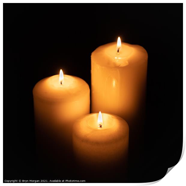 Three burning candles in the darkness Print by Bryn Morgan