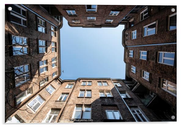 Upward view among the buildings in Warsaw Acrylic by Sergio Delle Vedove