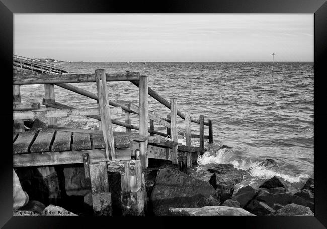 Steps to the beach covered at high tide at East Beach, Shoeburyness, Essex, UK. Framed Print by Peter Bolton