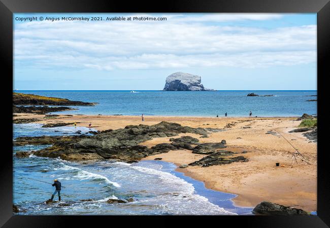 Fisherman and Bass Rock Framed Print by Angus McComiskey