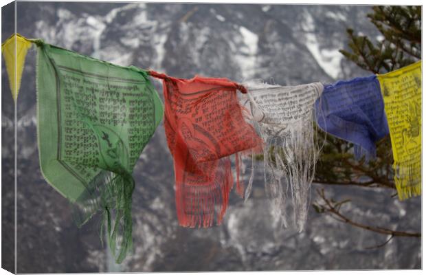 Buddhist Prayer Flags in the mountains of Nepal. Canvas Print by Christopher Stores