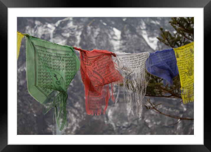 Buddhist Prayer Flags in the mountains of Nepal. Framed Mounted Print by Christopher Stores