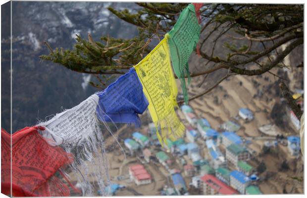 Namche Bazaar with Buddist Prayer Flags Canvas Print by Christopher Stores