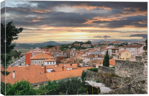 view of medieval city in Spain with colorful sky Canvas Print by David Galindo