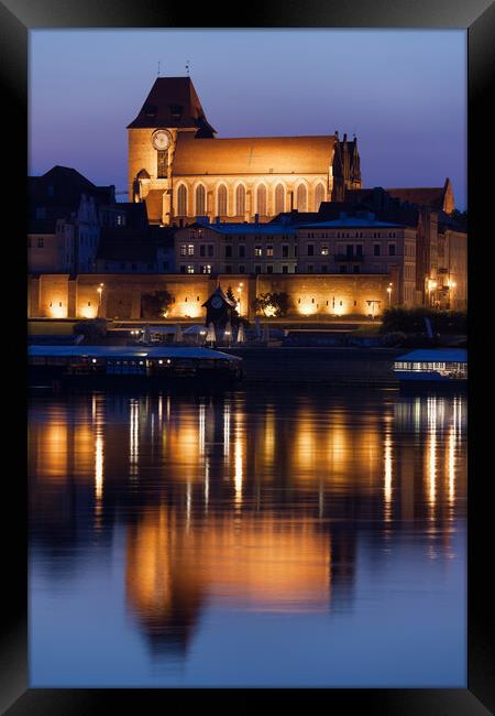 Torun Cathedral With Reflection In River Framed Print by Artur Bogacki