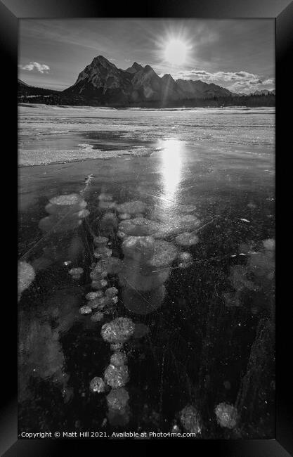 Frozen Ice bubbles on Abraham Lake Framed Print by Matt Hill