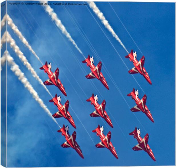 Red Arrows fighter jets flying through a blue sky Canvas Print by Andrew Heaps