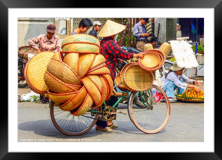 Street vendor on bicycle Framed Mounted Print by Kevin Hellon