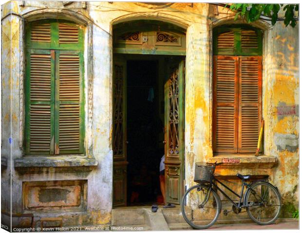 Old House in Hanoi with Bicycle Canvas Print by Kevin Hellon