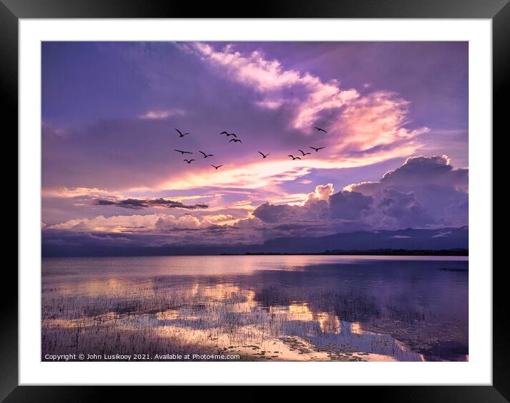 The view at dusk on Lake Poso Framed Mounted Print by John Lusikooy
