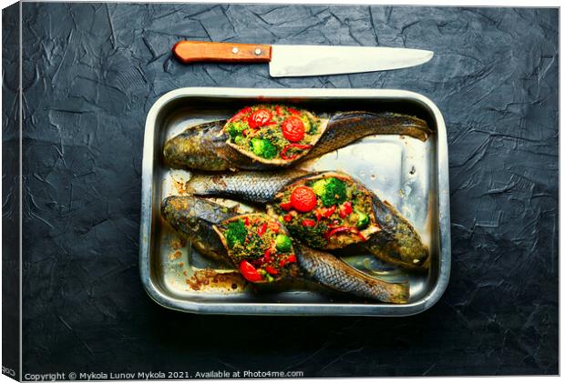 Baked fish stuffed with vegetables Canvas Print by Mykola Lunov Mykola