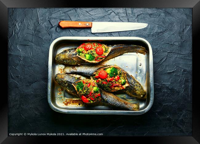 Baked fish stuffed with vegetables Framed Print by Mykola Lunov Mykola