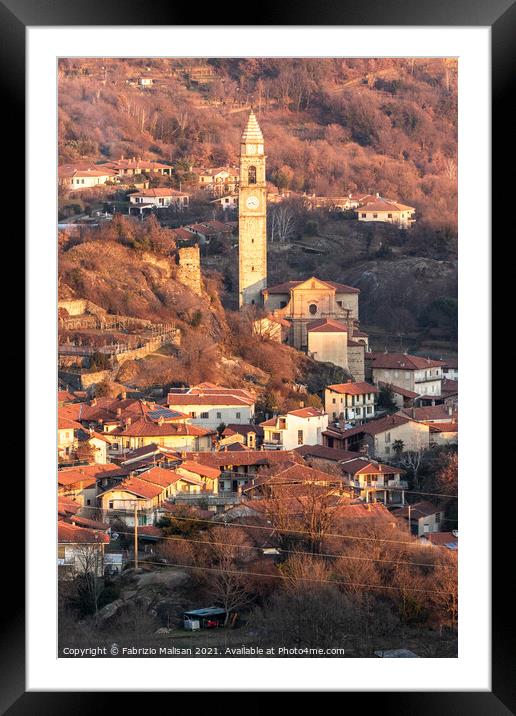 Afternoon sunlight over the village town and churc Framed Mounted Print by Fabrizio Malisan