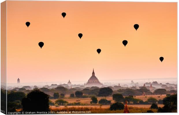 Balloons Over Bagan at Dawn Canvas Print by Graham Prentice